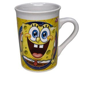 2014 Viacom Sponge Bob Square Pants happy/sad face 12 ounce yellow coffee mug